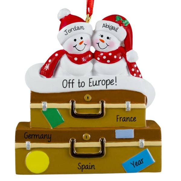 World Travelers Snow Couple On Suitcase Ornament