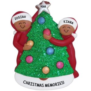 Image of Two African American Siblings Decorating Christmas Tree Ornament