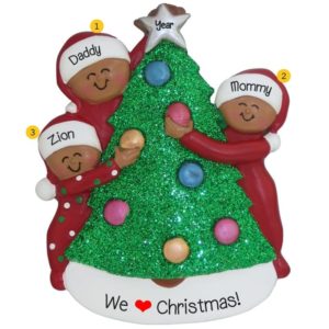 Image of African American Parents + 1 Child Decorating Christmas Tree Ornament