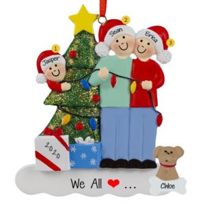 Image of Couple With 1 Child And Dog Stringing Lights Ornament
