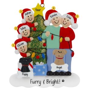 Image of Christmas Couple With 3 Kids And 2 Dogs Stringing Lights Ornament