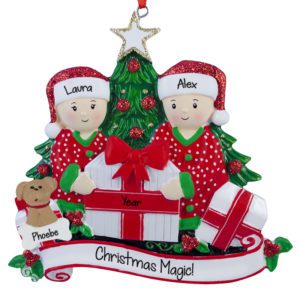 Couple With Dog Opening Presents By Tree Ornament