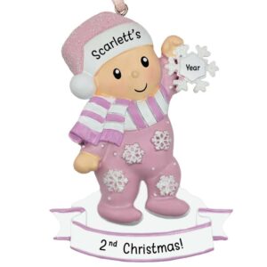 Image of Little Girl's Second Christmas Holding Glittered Snowflake Ornament PINK